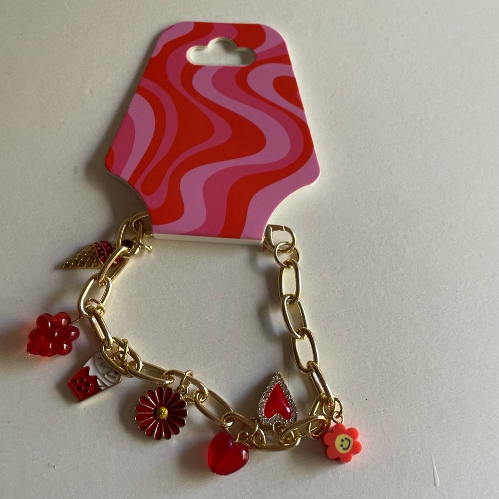 New gold charm bracelet